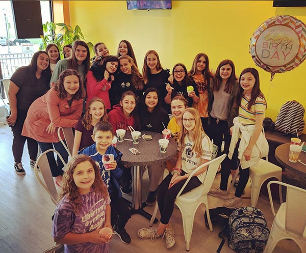 a group at our palatie location enjoying our ice cream and shaved ice