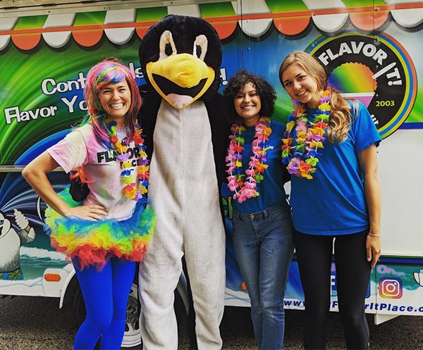 The My Flavor It! crew at an event with the food truck